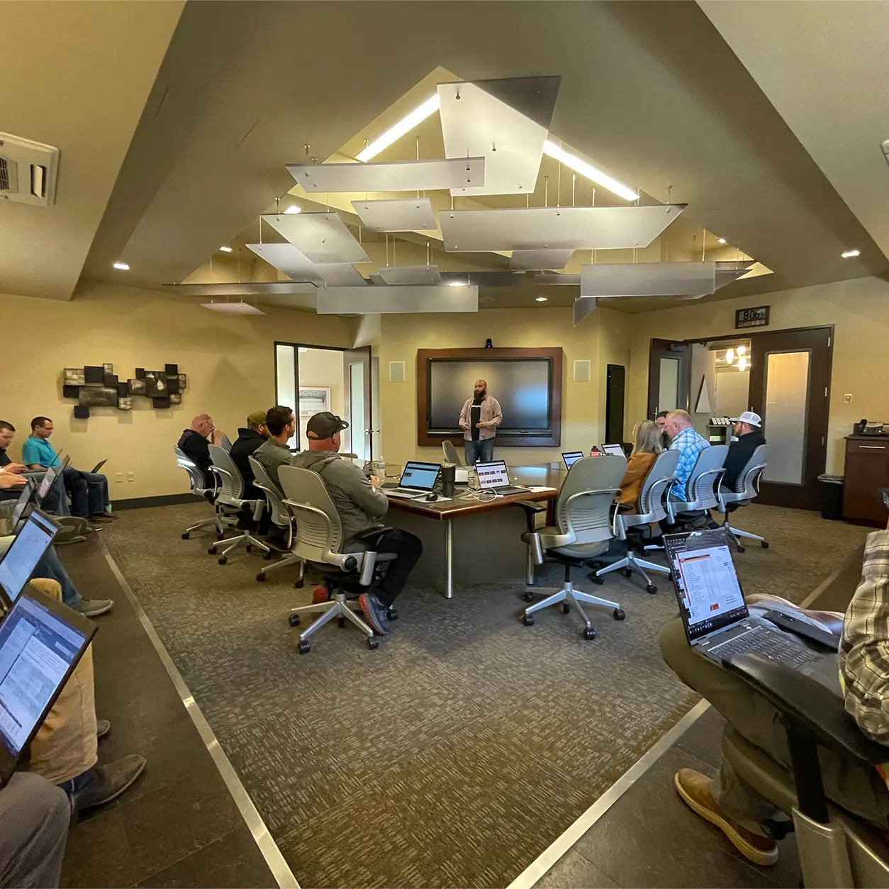 Torre, Customer Successor Manager at Outbuild doing a live onboarding in McAlvin's construction company offices