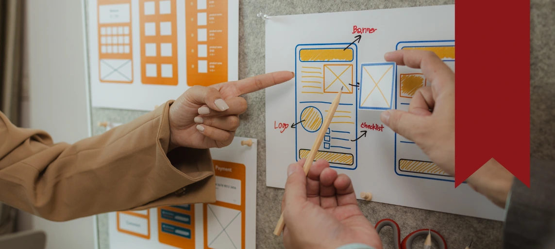Team collaborating on shared kitchen program design and operational planning using workflow mockups and structured process outlines.