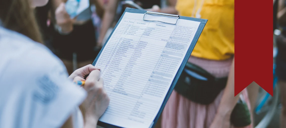 Community survey participant completing a needs assessment form to support shared kitchen planning and local food entrepreneurship initiatives.