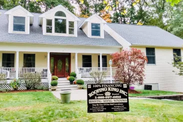House with a completed roof installation in Andover, MA.
