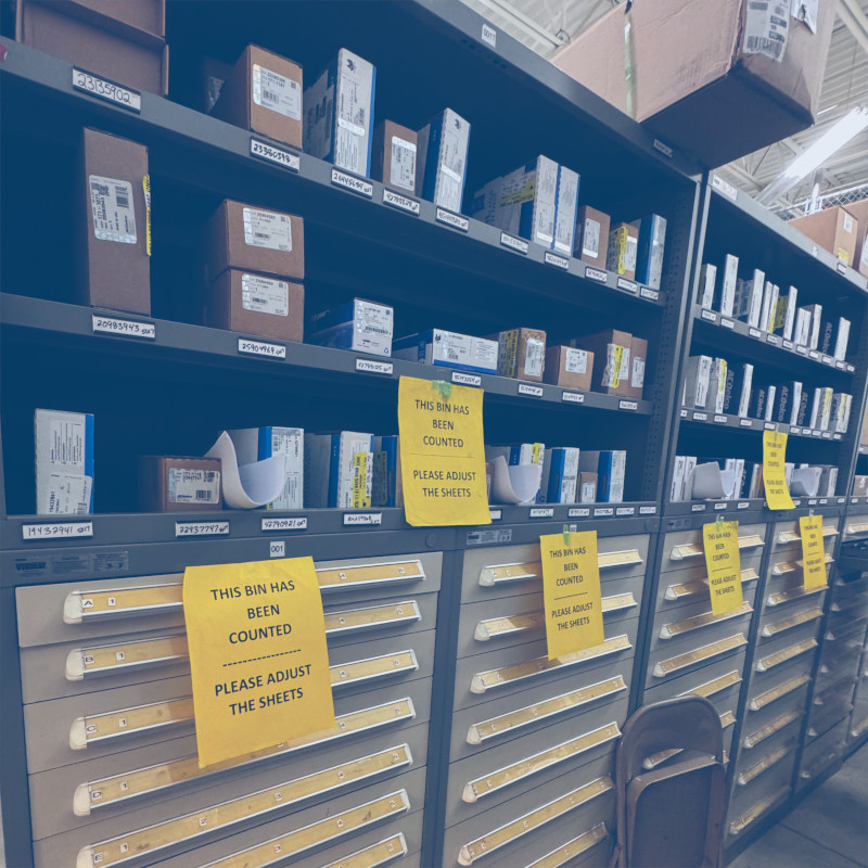 Inventory shelving locations at an automotive dealership that have been counted by Pro-Count employees