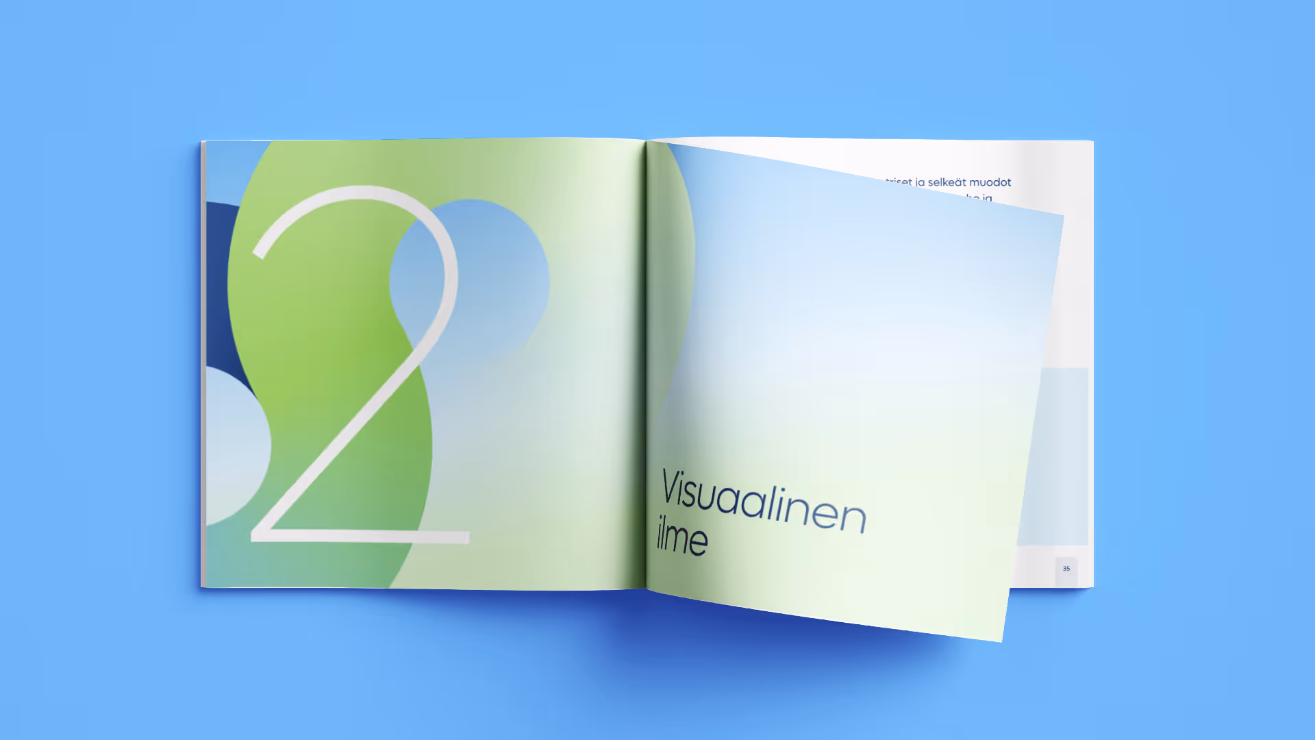Aukeava kirja, jonka vasemmalla sivulla suuri numero 2 vihreällä ja sinisellä taustalla, oikealla sivulla teksti 'Visuaalinen ilme'.