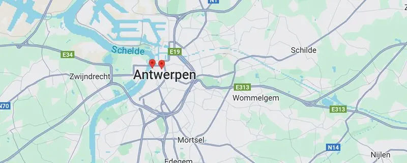 Map showing the city of Antwerpen in Belgium with surrounding towns Zwijndrecht, Mortsel, Wommelgem, Schilde, and Nijlen, along with major roads E34, E19, E313, N14, and N70.