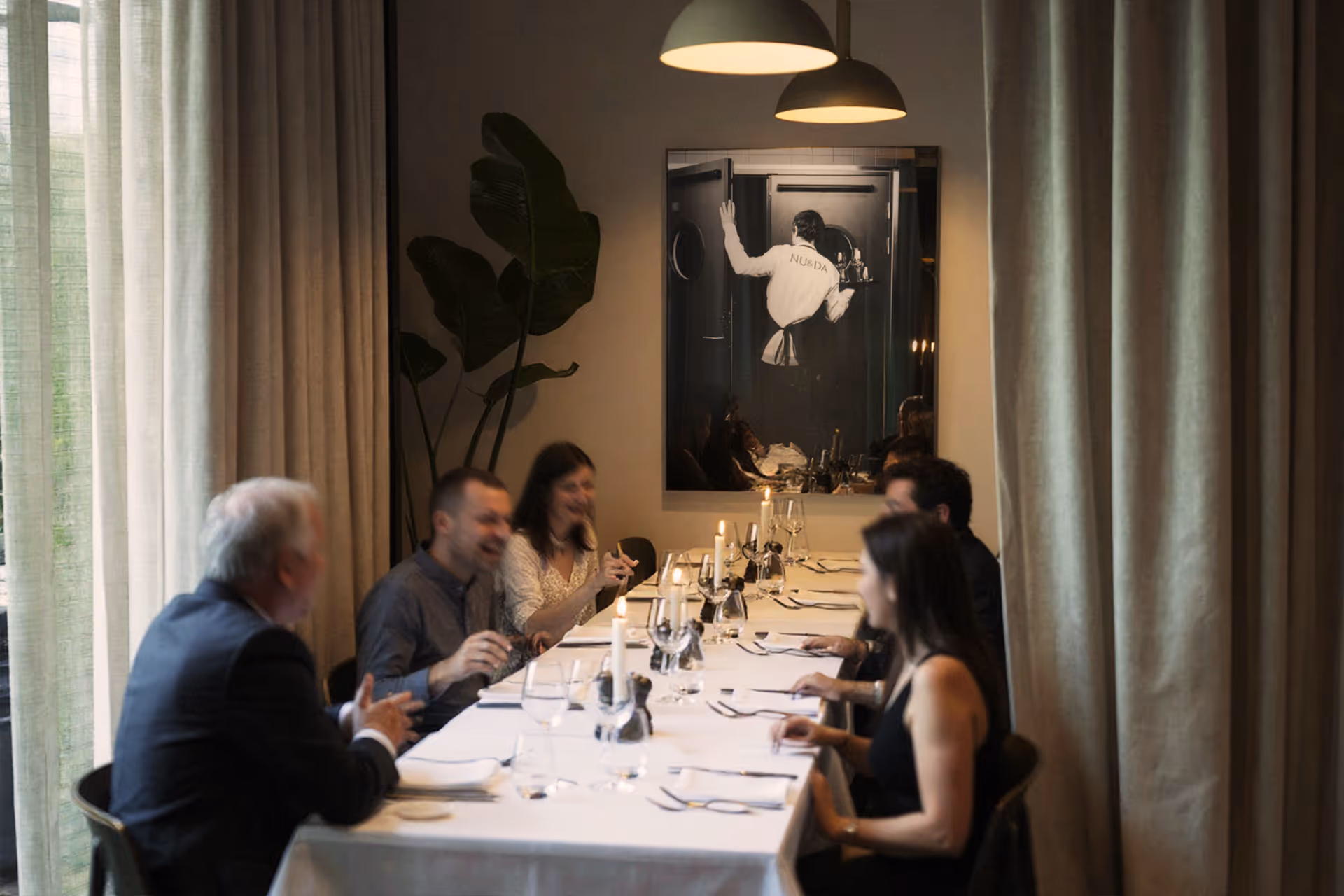 Group dinner at Restaurant NU&DA in private section.