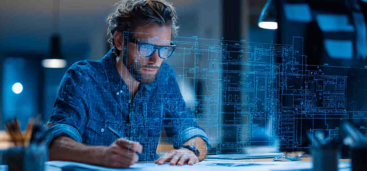Business owner looking over digital blueprints of their office IT setup, highlighting key connections in their réseau informatique