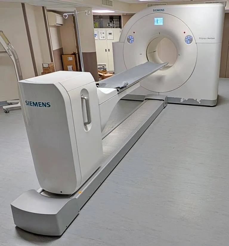 Siemens Biograph Horizon medical imaging PET scanner in a clinical room.