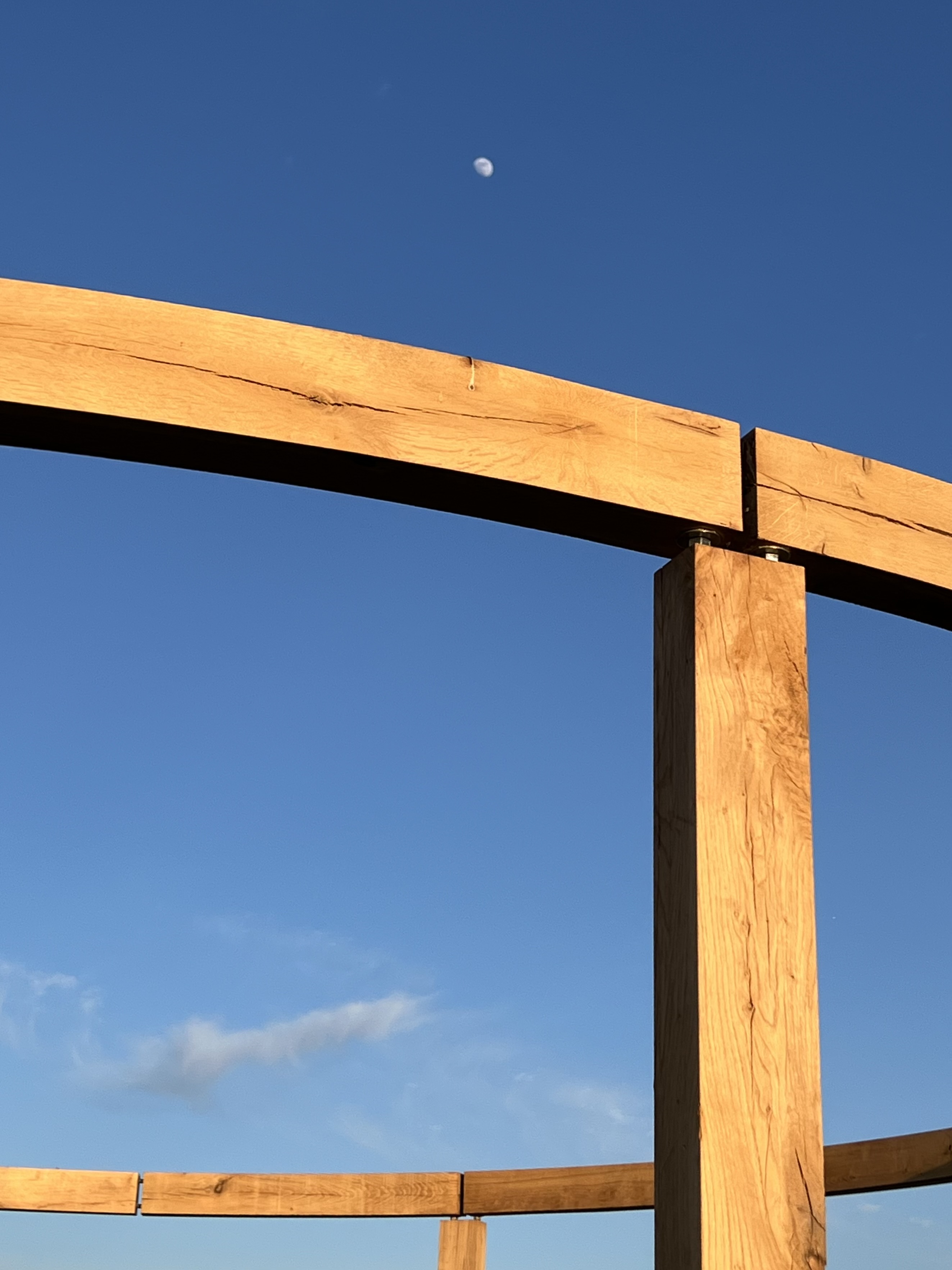 Henge, 2025 Oakwood, metal rod, sun, moon, 2280 × 6000 × 6000 cm