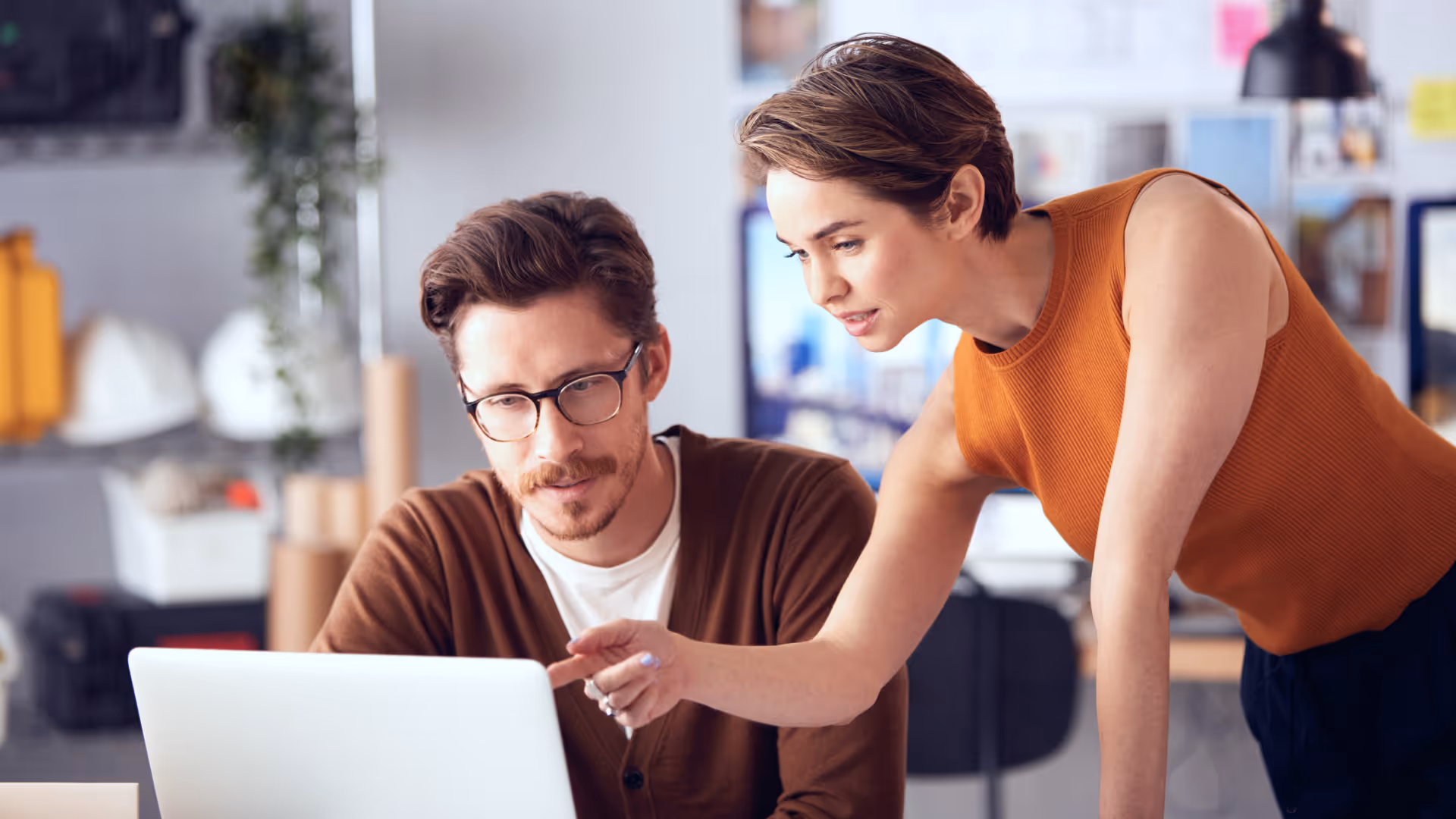 Two people working together in a pharma marketing company