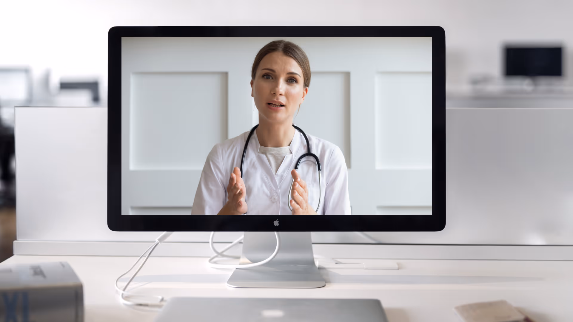 Remote detailing presentation showing a doctor speaking to a sales rep from a desktop computer screen