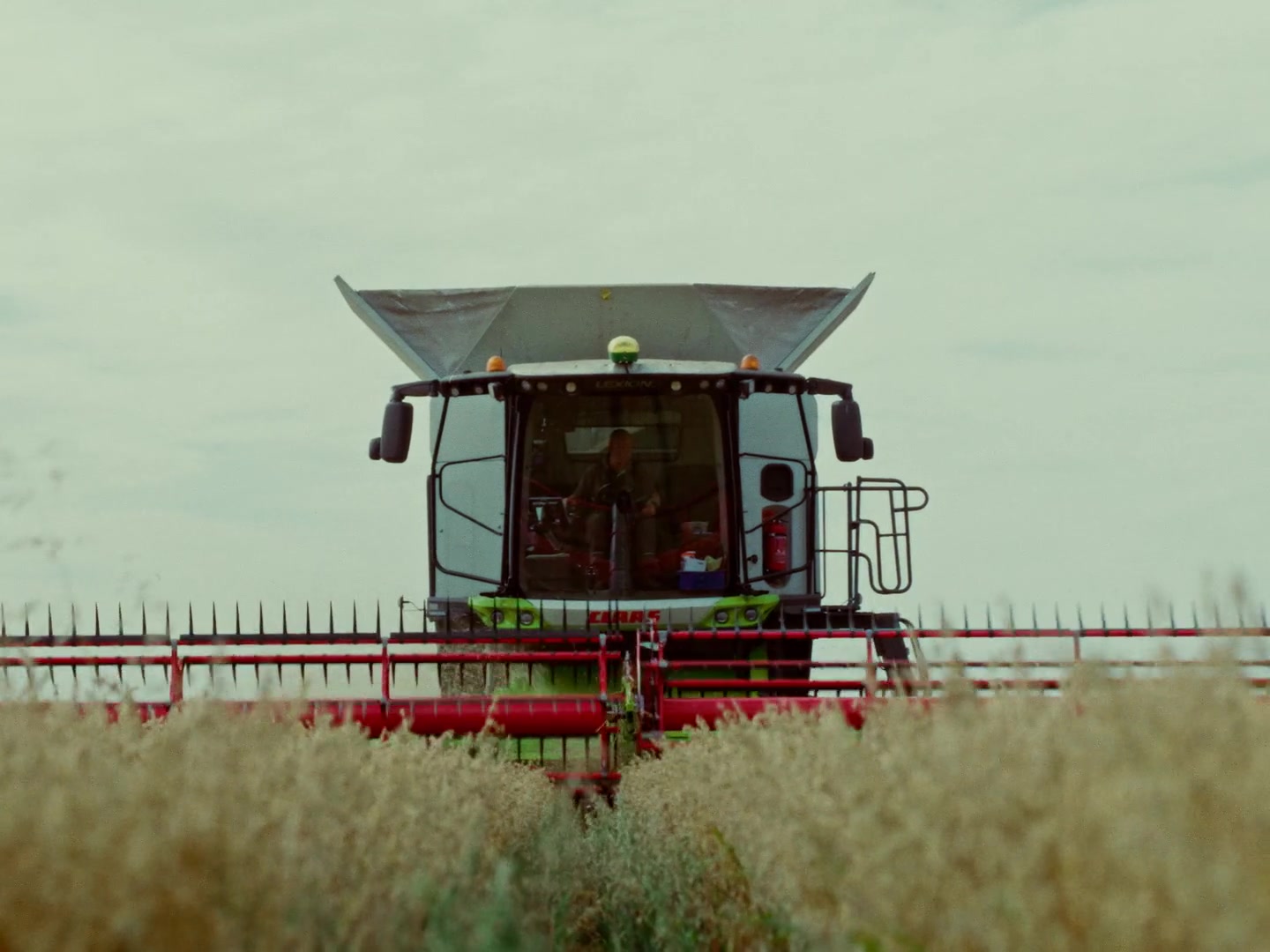 Combine harvester cutting wheat â from the NFU 'To Be a Farmer' production