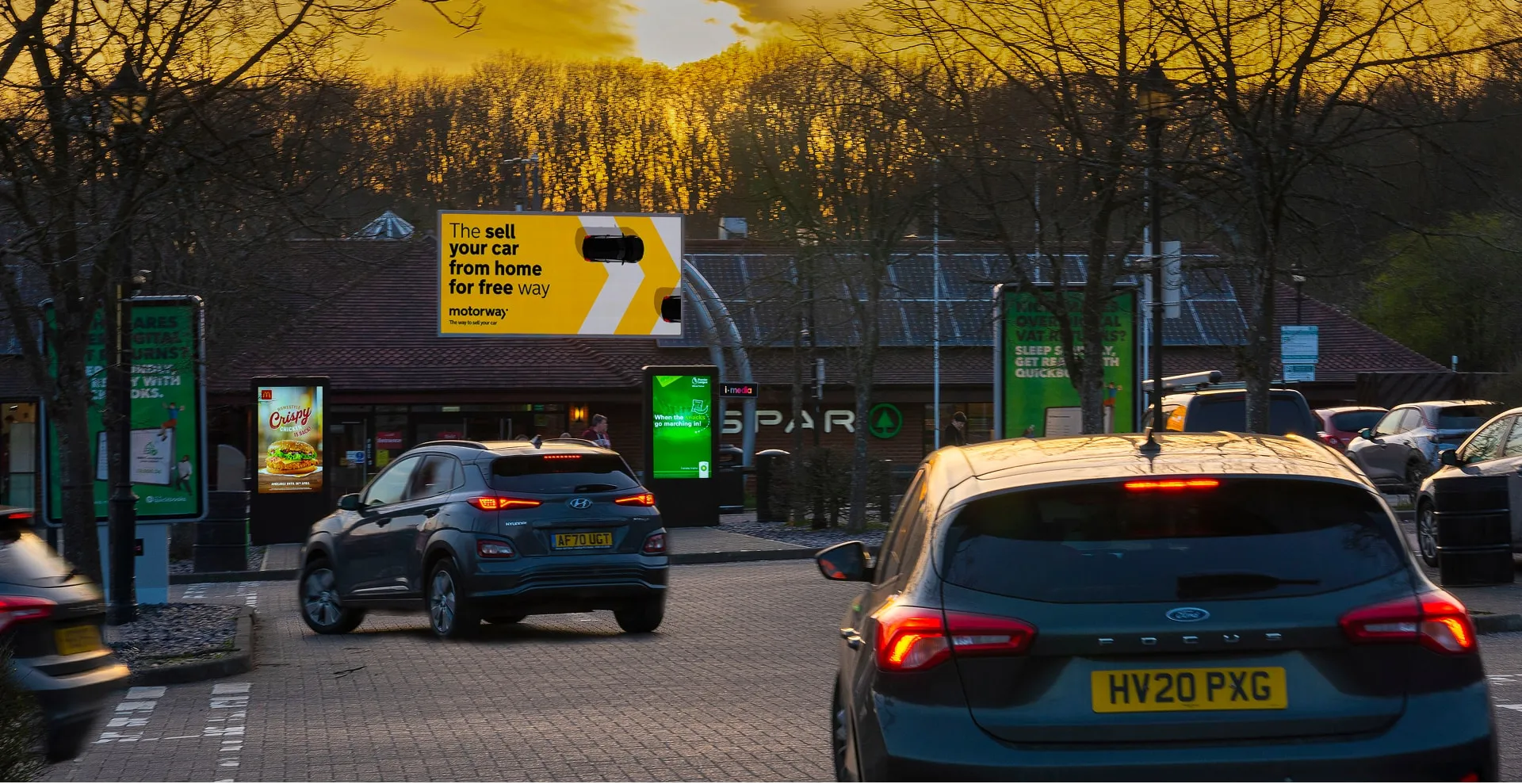 Service station with an I-Media billboard