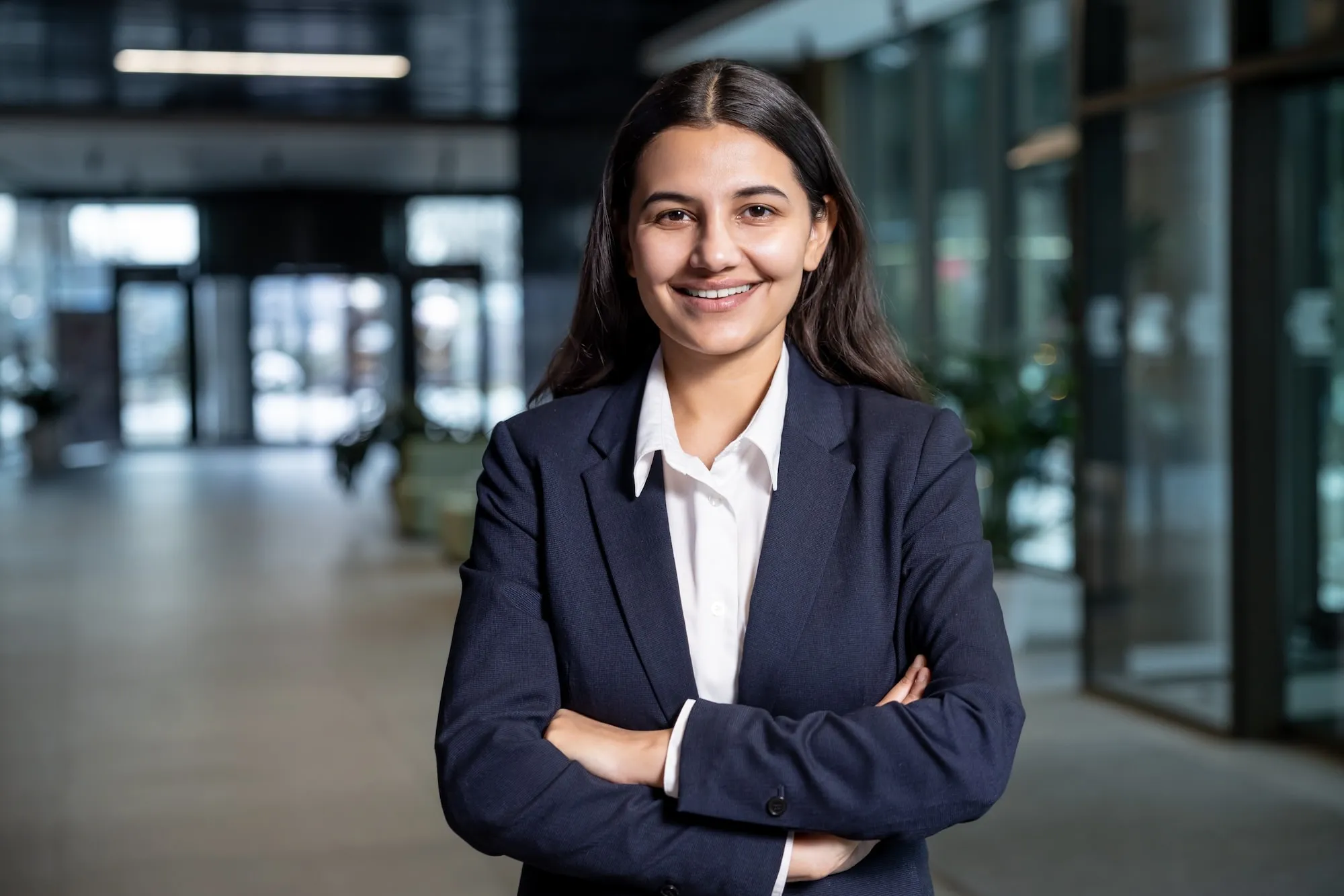 Young business woman looking pleased
