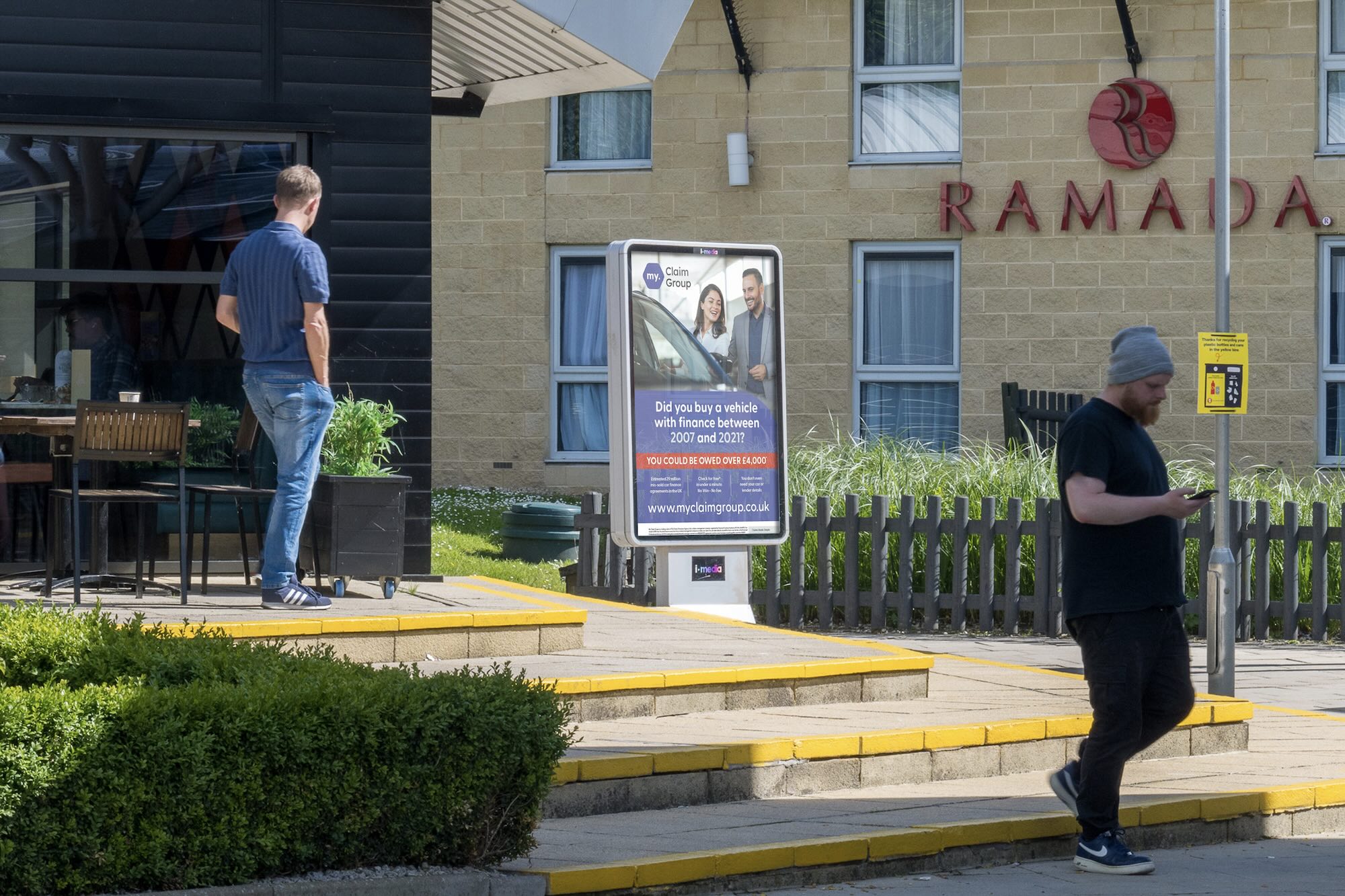 A static 6 sheet panel displayed in a motorway service area.