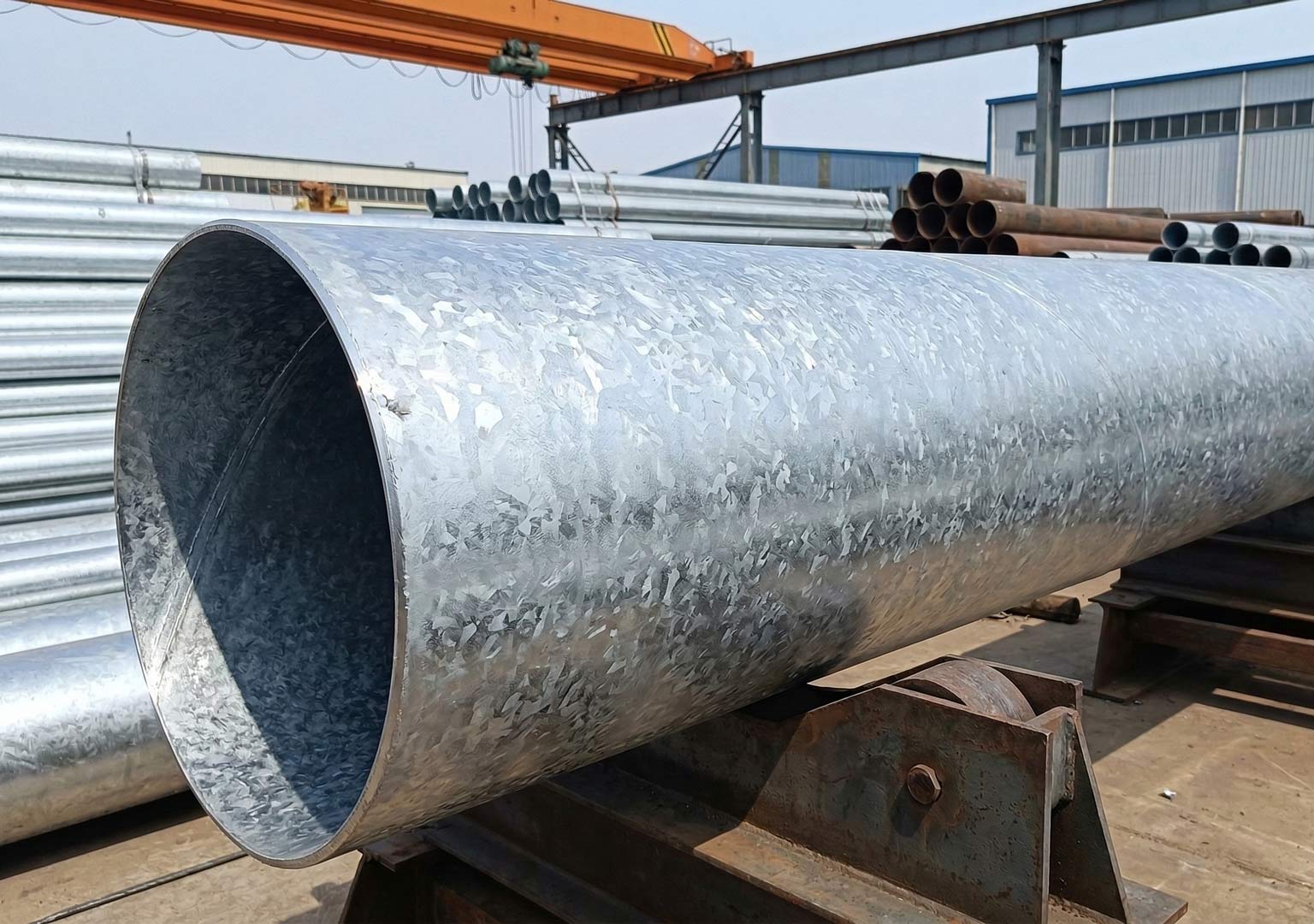 ASTM A53 steel pipe after hot dip galvanizing with visible zinc coating
