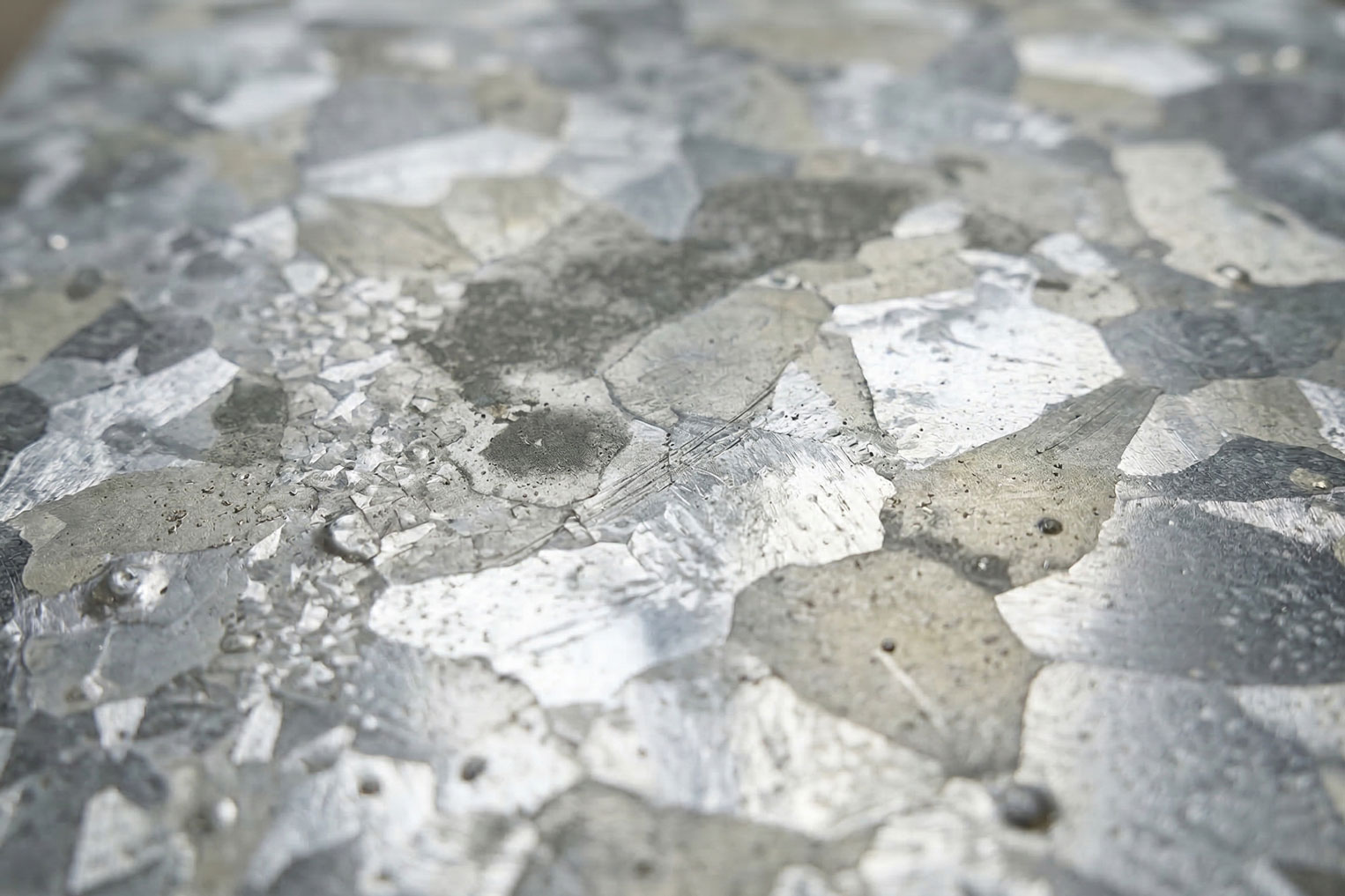 Hot dip galvanized steel surface showing typical appearance variation and zinc texture