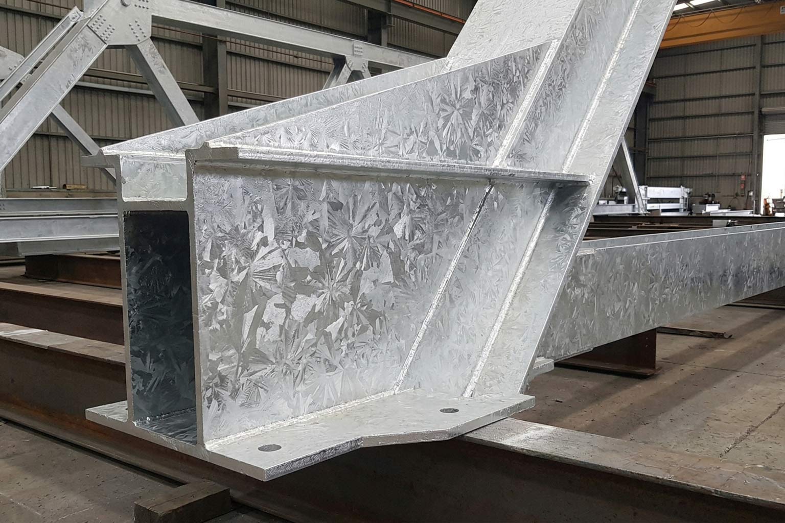 Structural steel component after hot dip galvanizing with visible zinc coating