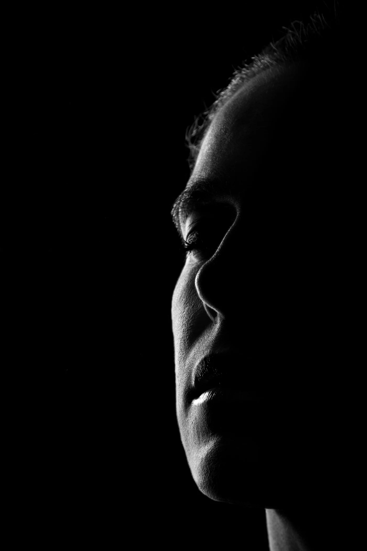 Portrait of a person in shadow