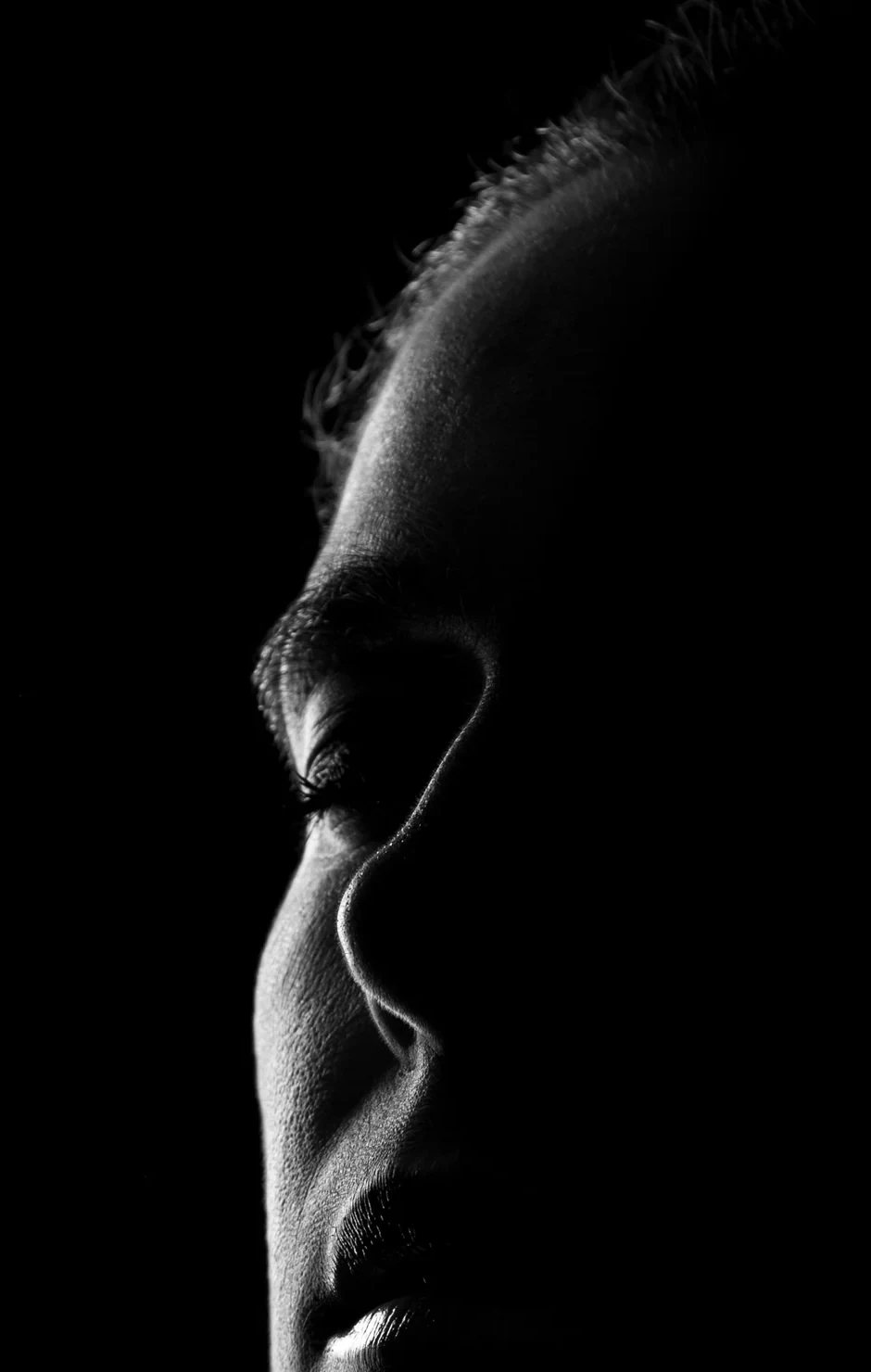 Portrait of a person in shadow