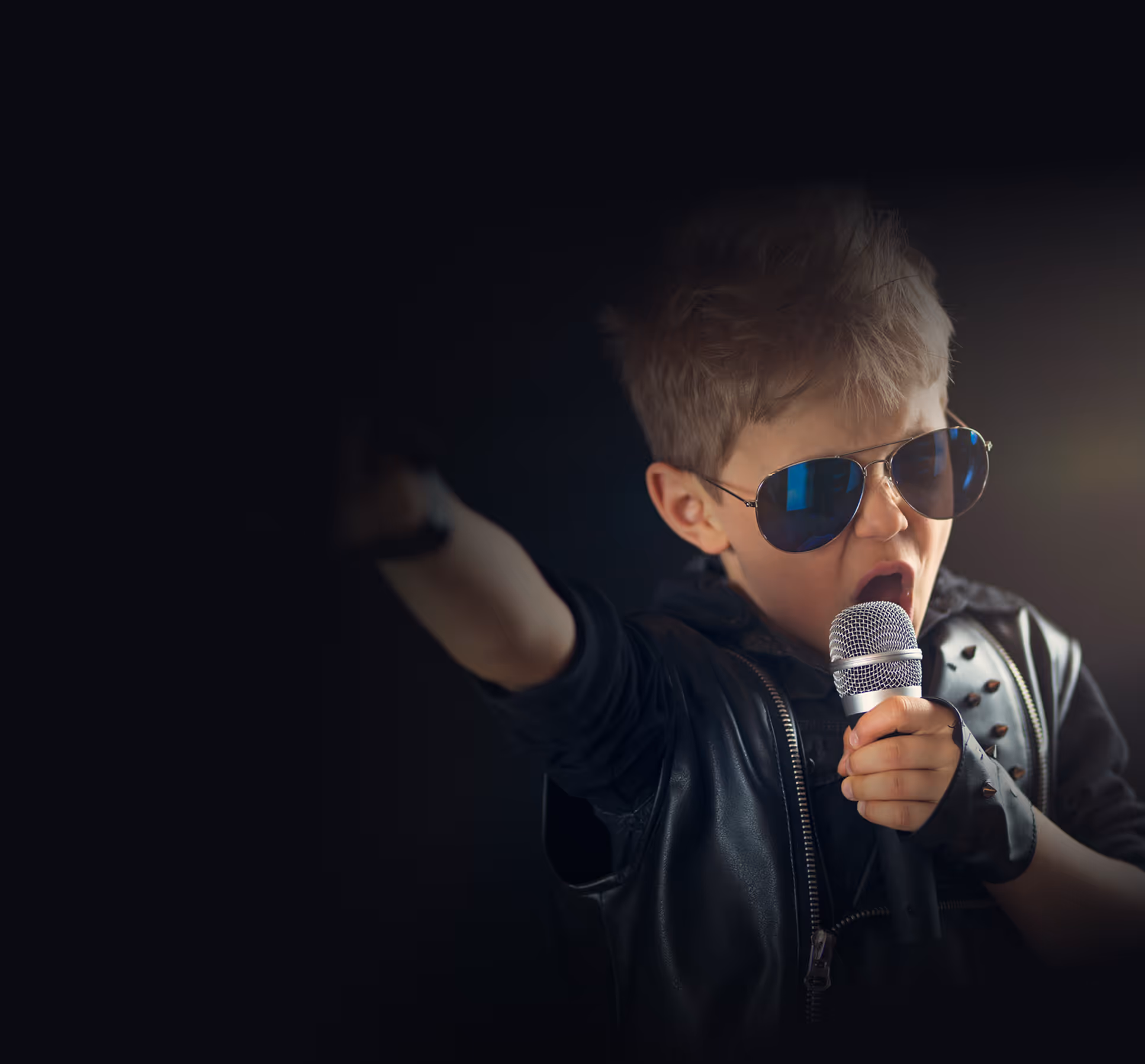 A child singing into a microphone