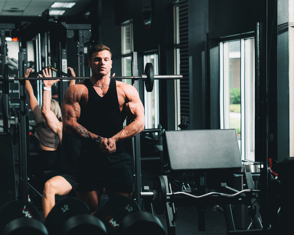 Posing in a mirror at Elite Fit Labz