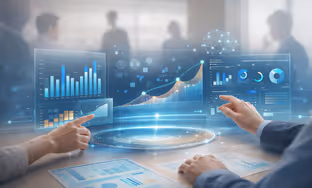 Two people interacting with a transparent digital interface displaying various futuristic business and data analytics charts.