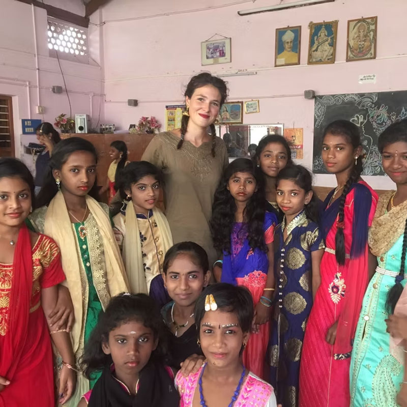 A group of children at Goodwill Children's Home gathered and smiling