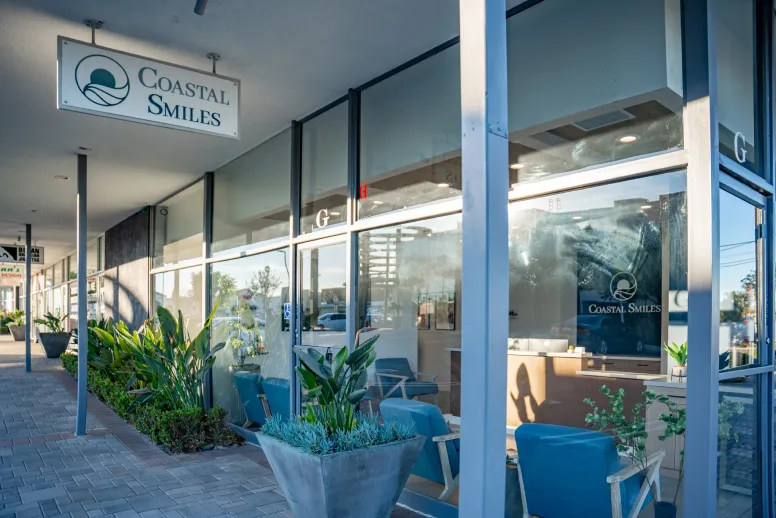 Exterior signage of Coastal Smiles in Cosa Mesa CA