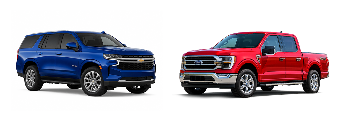 A suburban SUV facing a red Ford F150