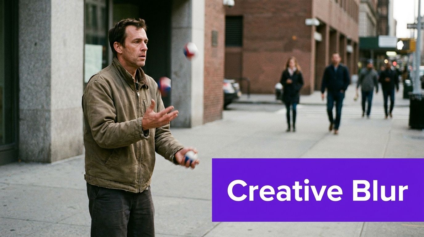 A man juggling colorful balls on a city sidewalk while people walk in the blurred background.