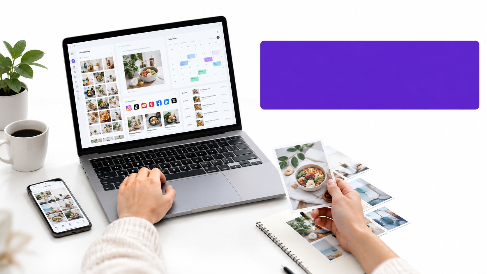 A person uses a laptop and mobile phone for content calendar creation, holding a photo of food.