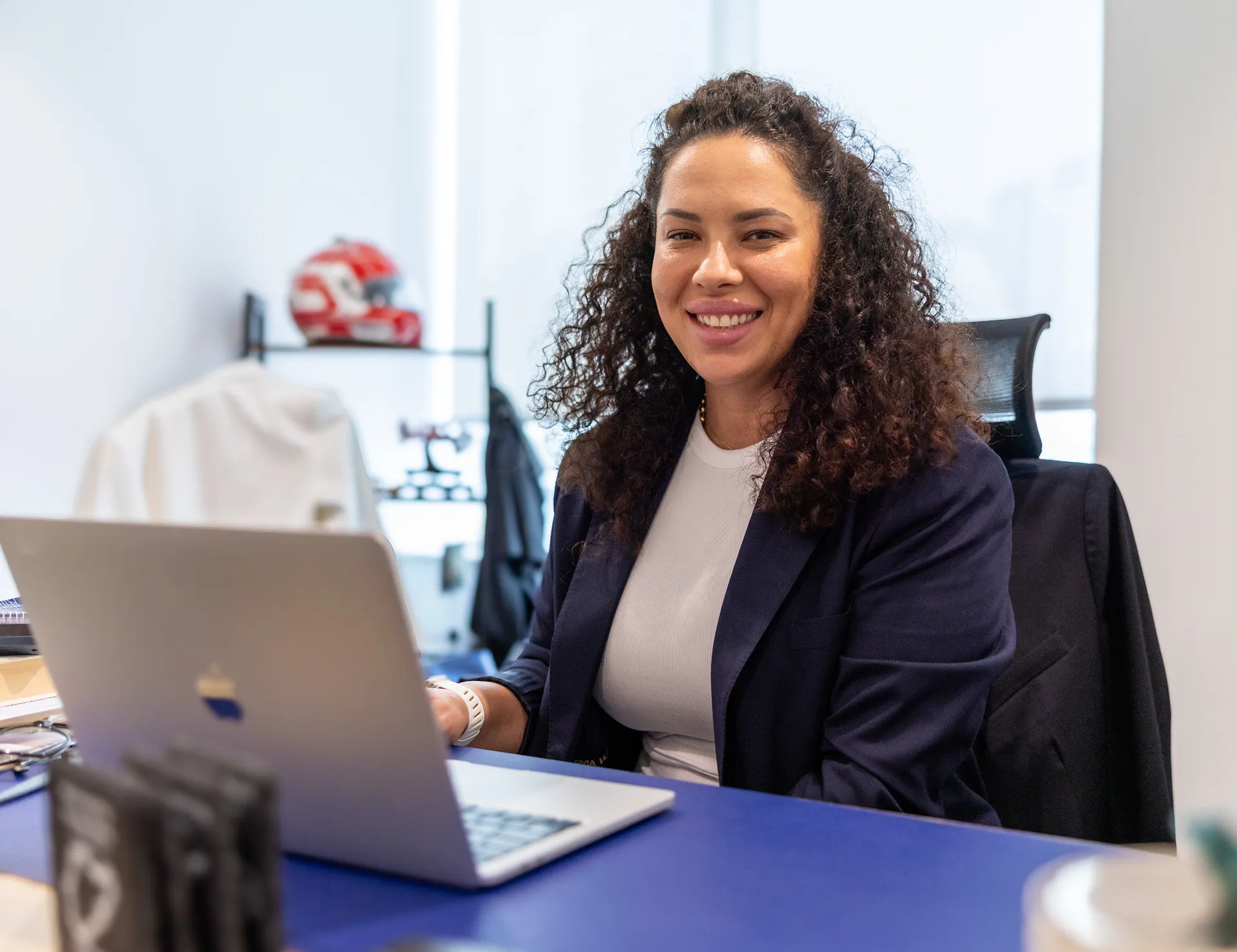 Maria Valeyeva, Chief Compliance Officer at Kayrouz & Associates, seated at her workspace in the firm’s office.