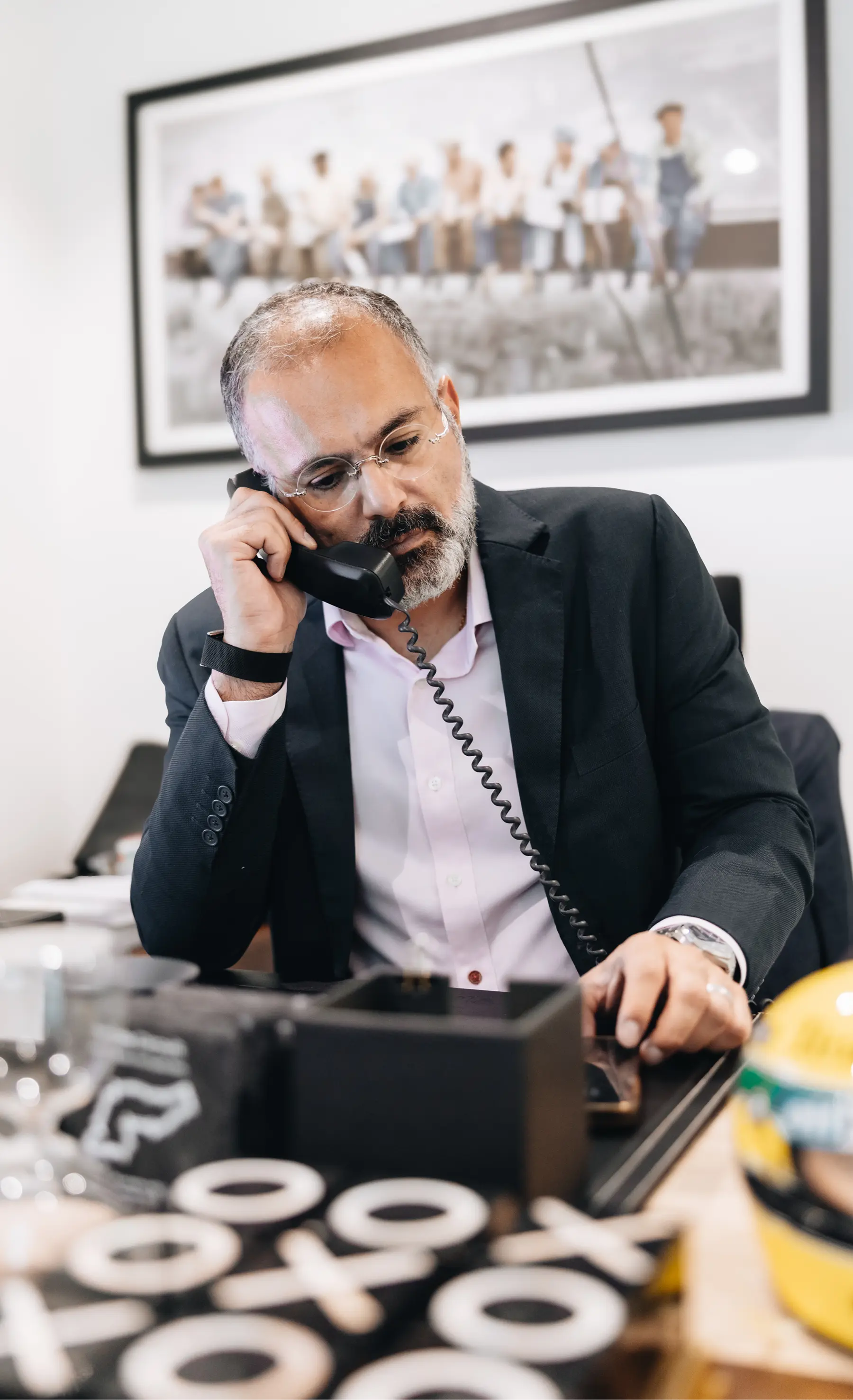 Patricia, business development lead at Kayrouz & Associates, seated during a client-focused meeting.