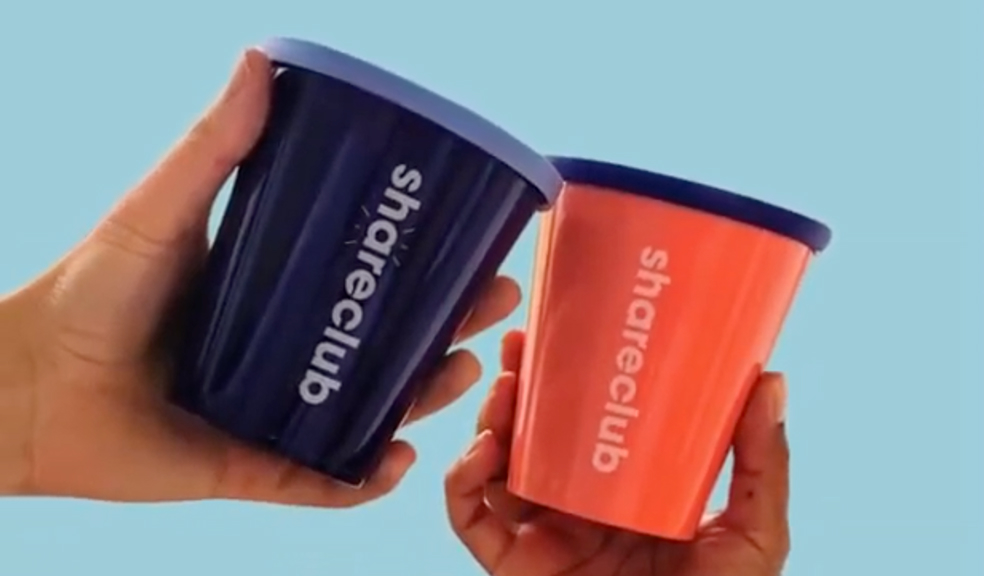 Two Shareclub hot drink reusable cups.