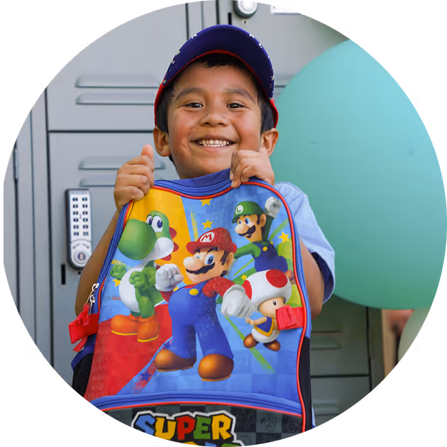 kid with mario tshirt