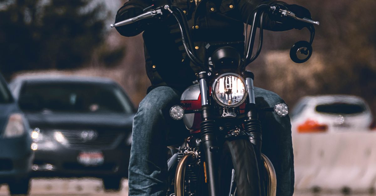 Motorcycle rider on the highway — motorcycle insurance from The Admirals Group in Denton, TX