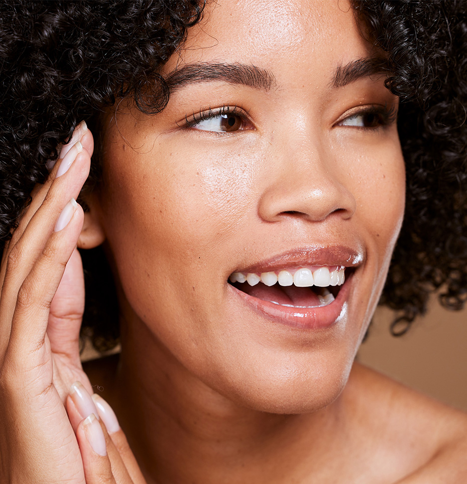 Smiling black woman with beautiful skin