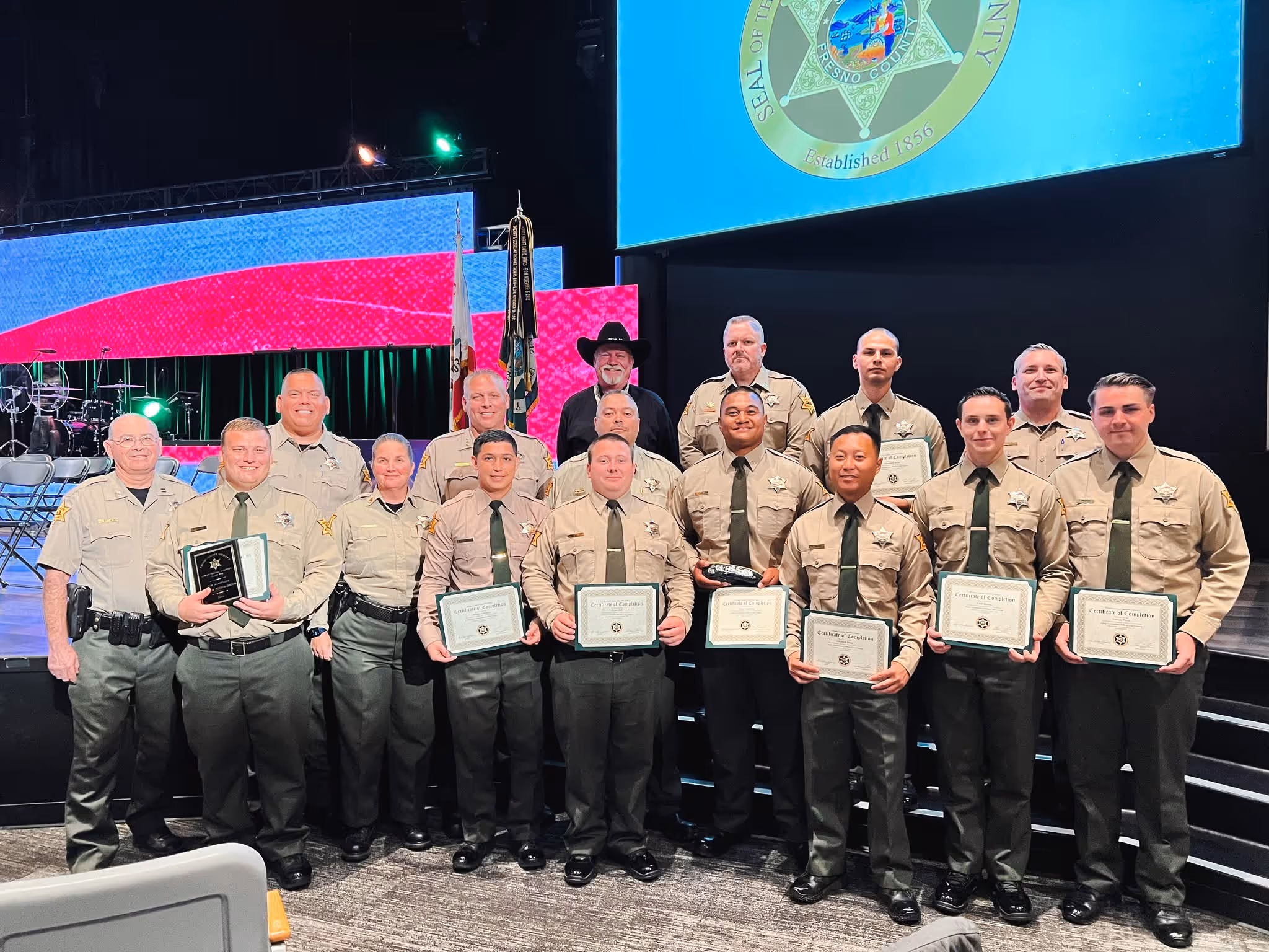 Group of Merced County SCA Deputies holding certificates