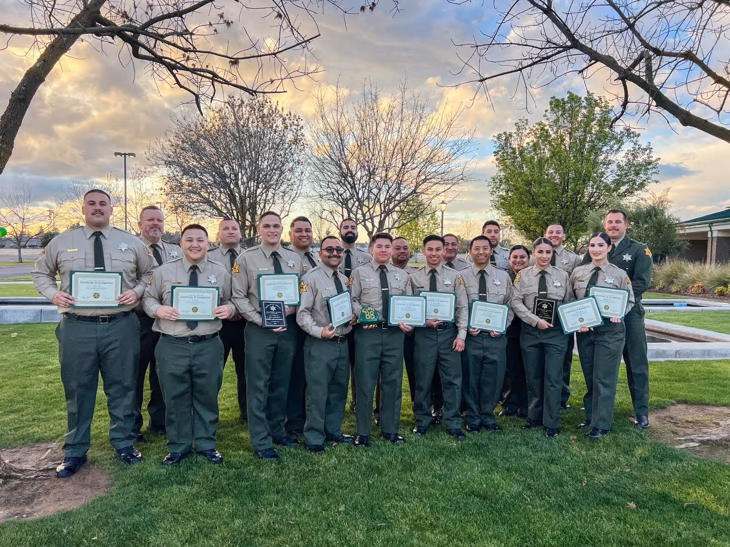 Group photo of Merced County SCA Deputies holding certificates