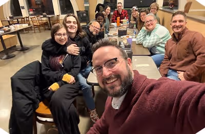 A group of people around a table