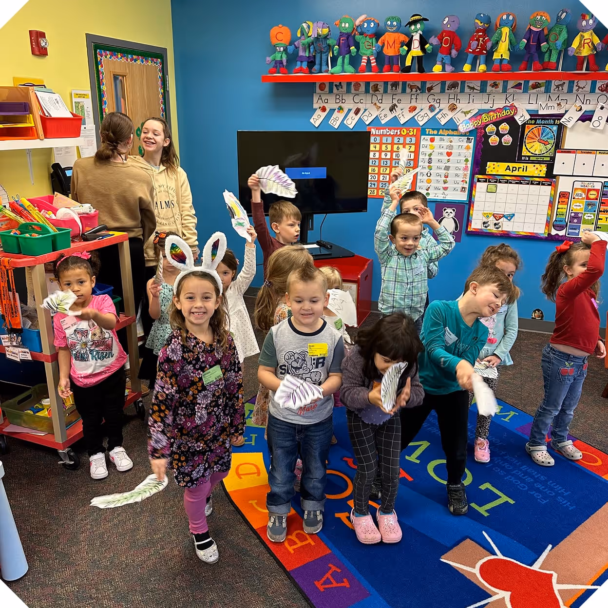 a group of children in the play area in kids church
