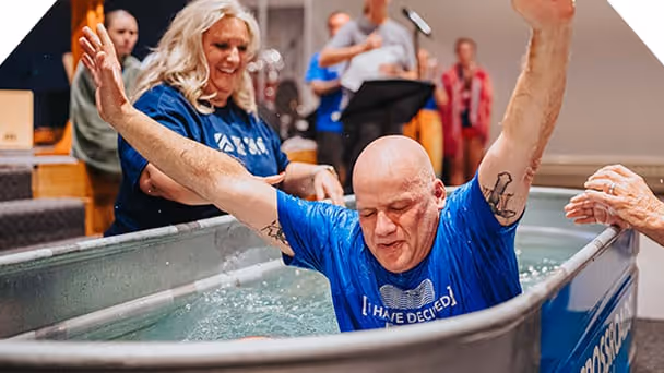 A man celebrating his baptism