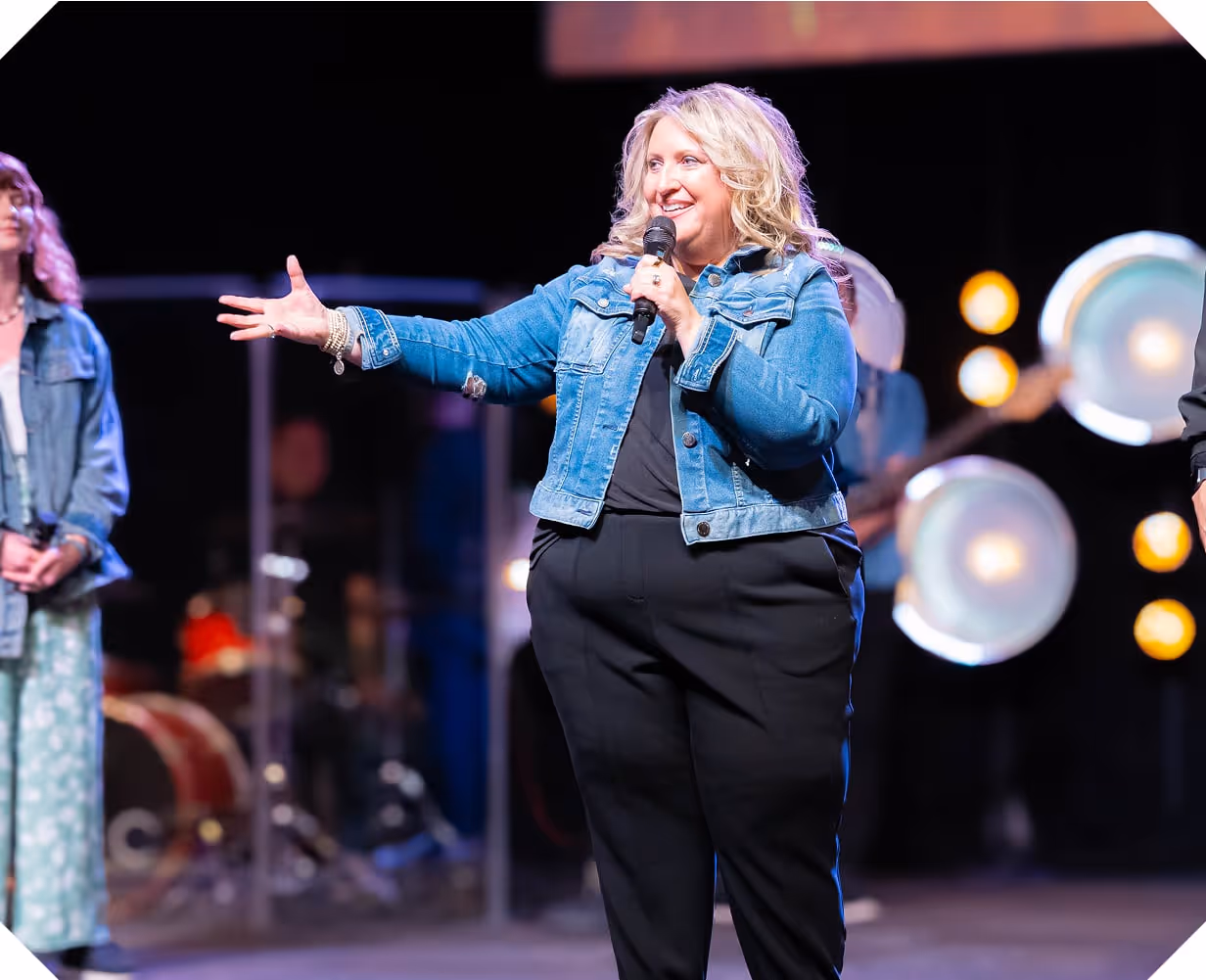 a pastor holding a microphone