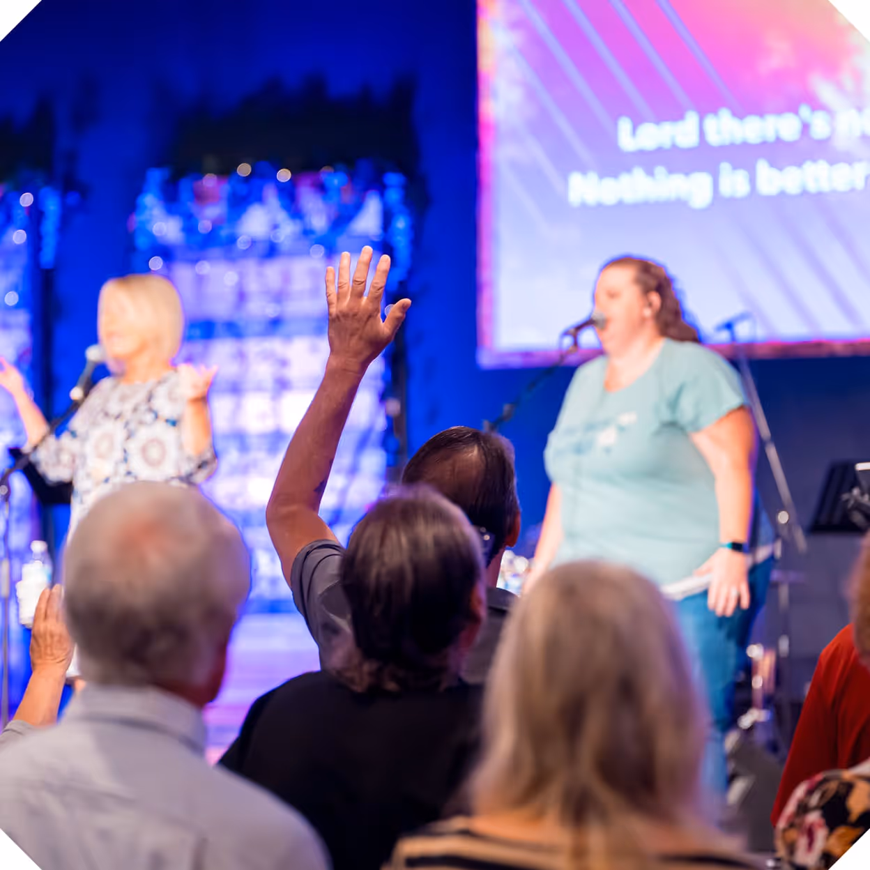 A hand raised during worship