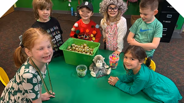 a group of preschoolers gathered together at class