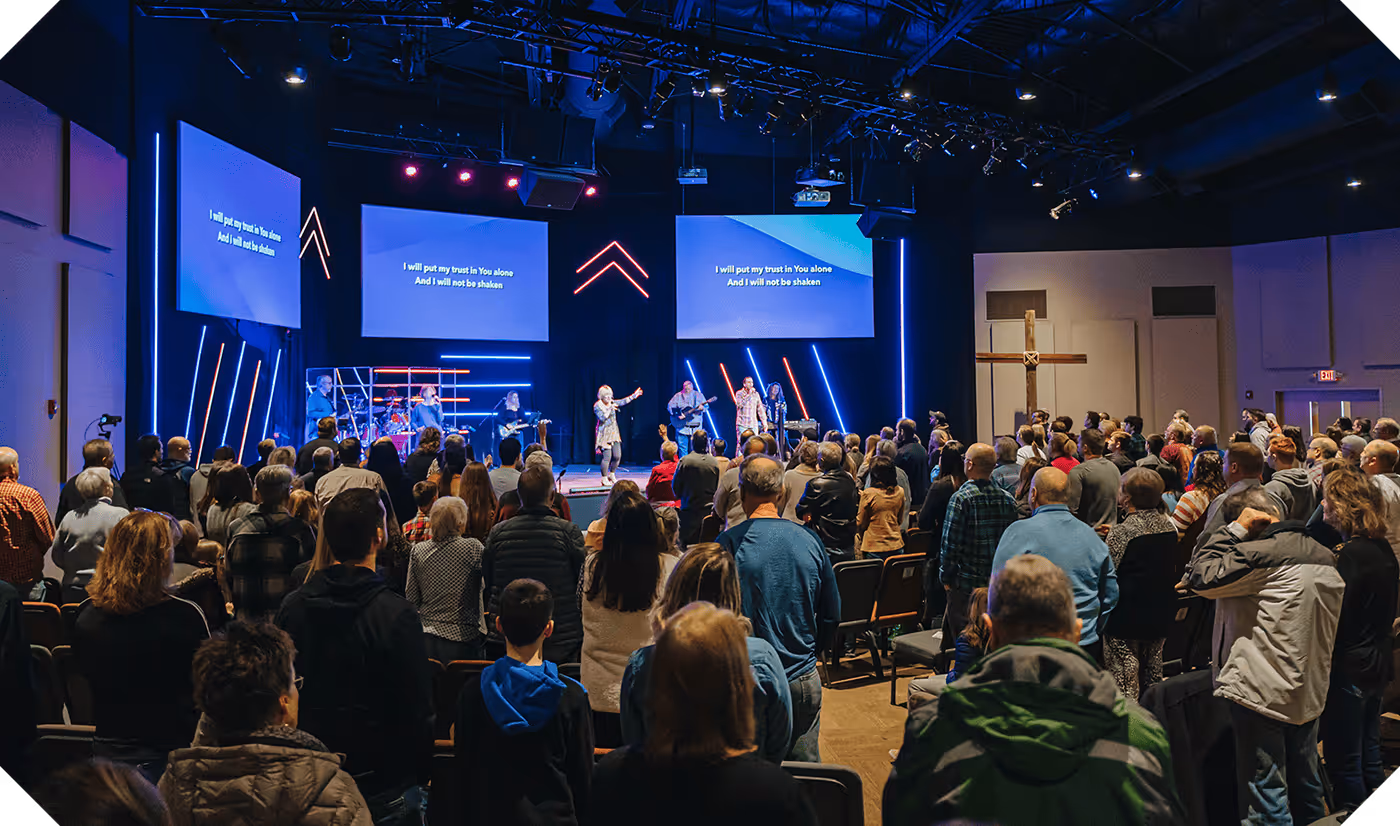 A full room view of the worship service