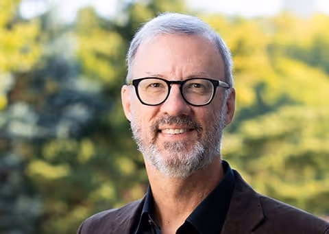 a headshot of the founding pastor