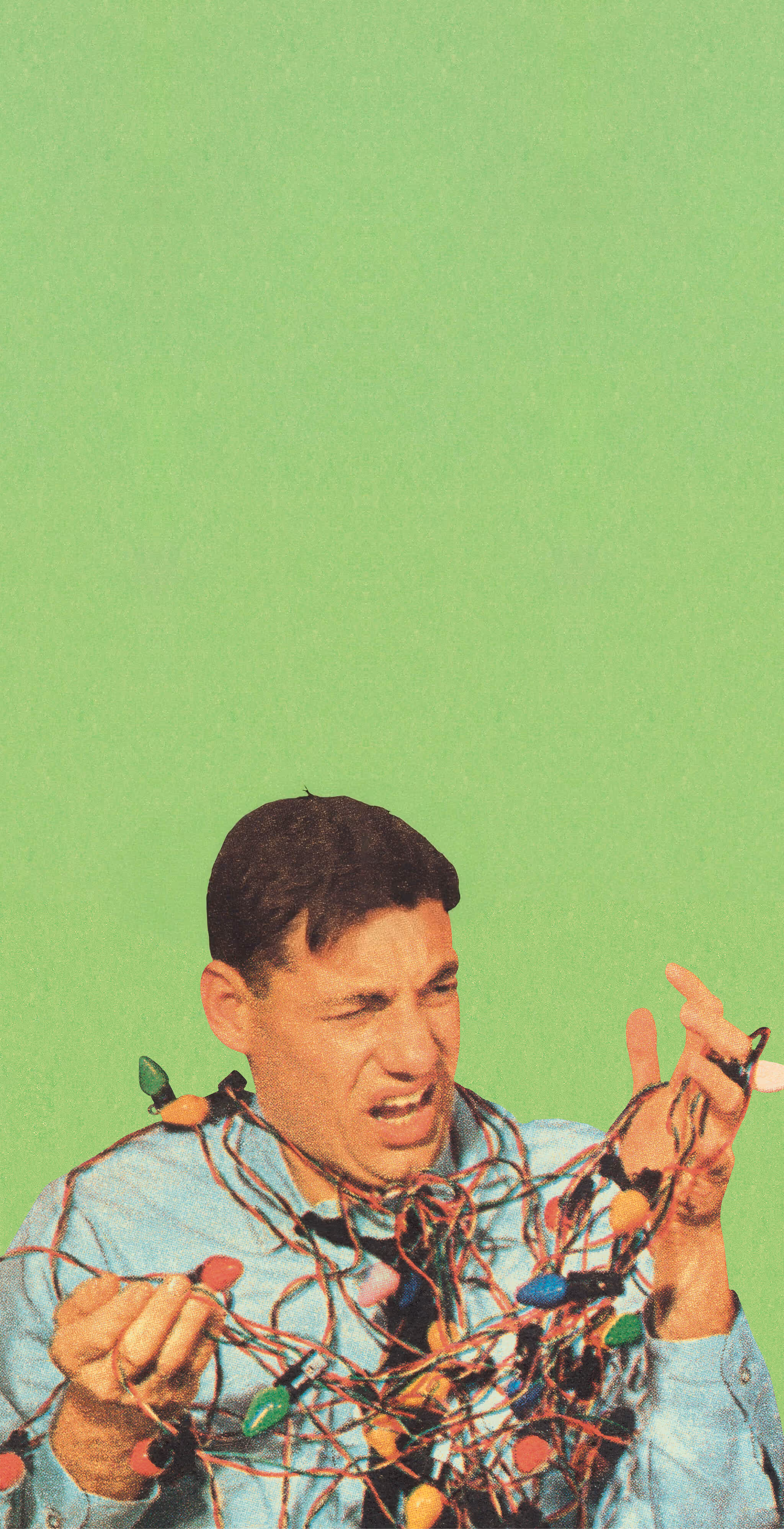 Man tangled in colorful Christmas lights with a frustrated expression against a green background.