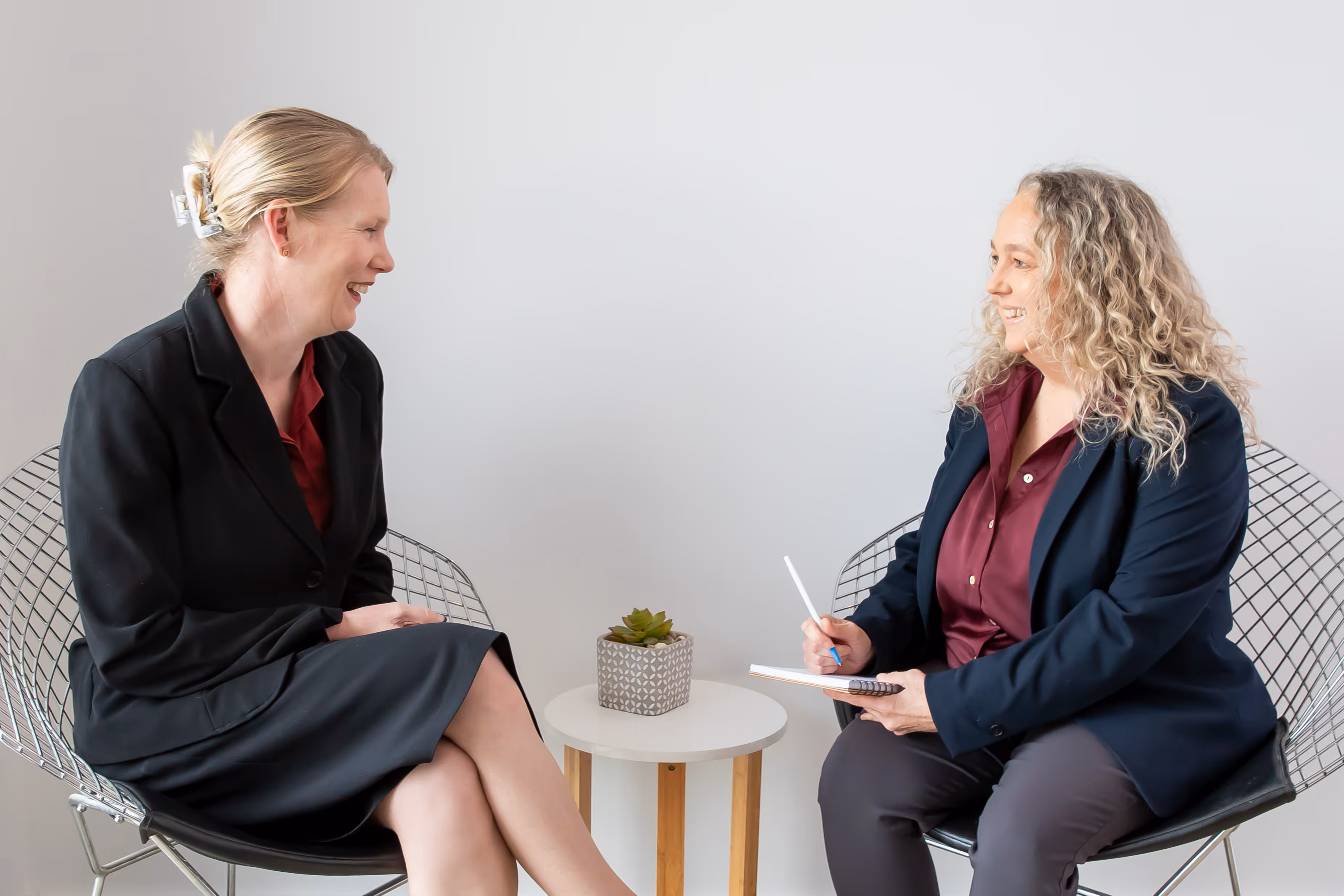 Amanda, the director of Transformed Consulting, conducting a discovery session with a business owner.
