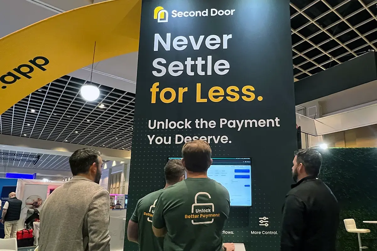 The Second Door team stands at their PPS 2025 booth.