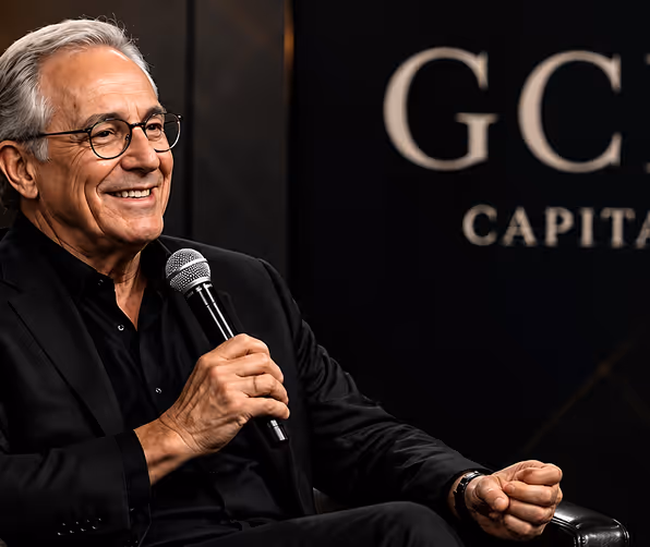 Founder presenting on stage at a Global Capital Network investor event
